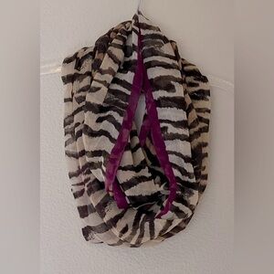 Zebra print Infinity Scarf with purple trim.